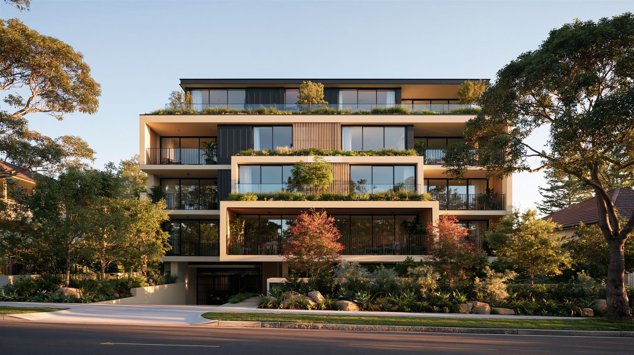 Terraced residences with planted balconies at golden hour
